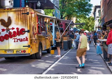 Knoxville, Tennessee, USA - August 8, 2022:  People During Farmers Market Getting Food From Food Trucks.