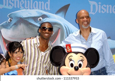 Kobe Bryant And Family With Kareem Abdul Jabbar At The Opening Of Disneyland's 