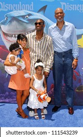 Kobe Bryant And Family With Kareem Abdul Jabbar At The Opening Of Disneyland's 