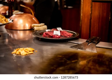 KOBE, JAPAN - DECEMBER 28, 2018 : Steak Land Kobe Kan, The Shop Features Teppanyaki. There Is A Iron Pan Around The Shop. The Seat Of Customer Beside The Iron Pan And Chef Come To Grill At The Table.