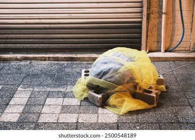 [KOBE]A beautiful illuminated view of Japan's representative Chinatown and a garbage bag, Sannomiya, Kobe, Japan - Powered by Shutterstock