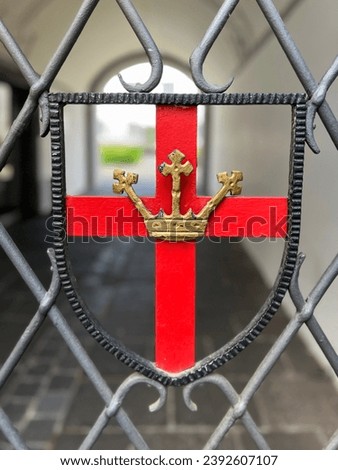Koblenz, Germany Coat of Arms Symbol close-up view. Looking through an arched gate corridor. Koblenz is one of Germany's oldest and most beautiful cities. A UNESCO World Heritage Site.
