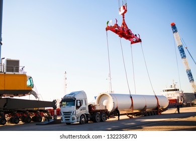 Kocaeli, Turkey - January 18, 2019: Storage tank, loading operation of project cargo with port heavy lift cranes