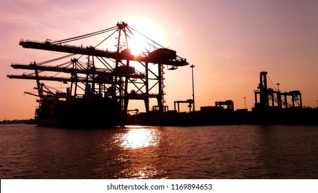 Kochi docks and shipping container port in a evening