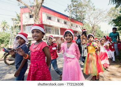 Kochi, India - December 23, 2015: Pupils Celebrating Christmas In The St. Ann's Public School (Kerala, India). Children Wish Merry Christmas To Local Citizens