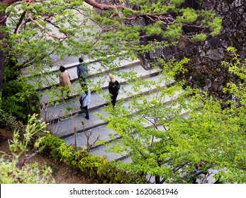 Kochi, Japan - April 6, 2018: Visitors Climbing Stone Steps Leading To Kochi Castle, One Of The 12 Original Edo Period Castles Of Japan