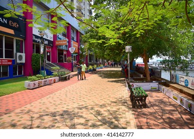 KOCHI, KERALA, INDIA, APRIL 30, 2016: Marine Drive - the picturesque promenade facing the backwaters. A favorite hangout for the locals and tourists.