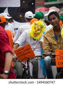 Kochi, Kerala State, India - September 2nd 2019 - A Boy Wearing Tiger Mask Cycling With Anti Drug Slogans Written In Malayalam Language In Athachamayam Procession Held At Thripunithura In Kochi City