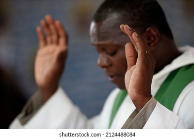 Koeroma catholic parish. African priest. Catholic church.  Togo.  06-30-2014