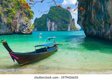 Koh Lao Lading or Koh Lao Rakhing ( Lao Lading Island ) is small island offering picturesque white-sand shores and swimming coves surrounded by limestone cliffs, Krabi Thailand.