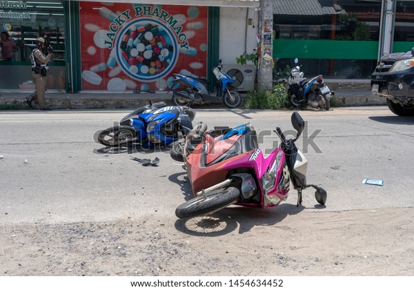 KOH
PHANGAN, THAILAND - MAY 19, 2019 : Motorcycle accident that
happened on the road at tropical island Koh Phangan, Thailand .
Traffic accident between a motorcycle on
street