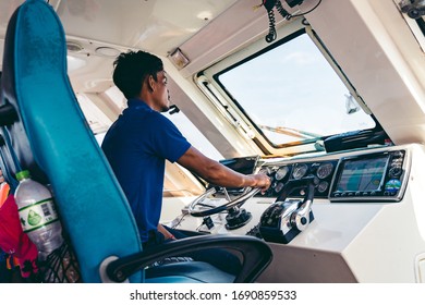 Koh Rong / Cambodia - 12/06/2018: Speed Ferry Captain Controls The Ship