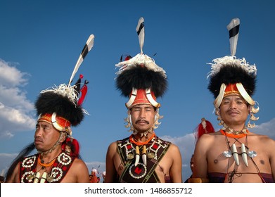 KOHIMA, NAGALAND, INDIA - January 16, 2004 : Portrait of Konyak Naga tribesmen in traditional outfit and headgear.