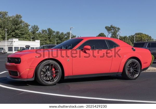 Kokomo - Circa August 2021: Dodge Challenger display\
at a dealership. The Stellantis subsidiaries of FCA are Chrysler,\
Dodge, Jeep, and Ram.