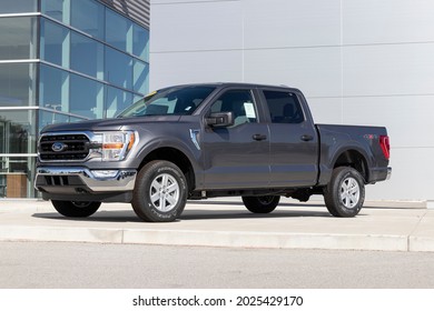 Kokomo - Circa August 2021: Ford F-150 display at a dealership. The Ford F150 is available in XL, XLT, Lariat, King Ranch, Platinum, and Limited models.