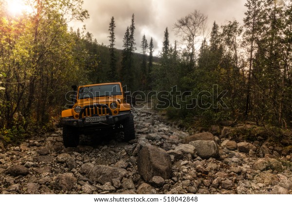 Kola Peninsula, Murmansk region, Russia,
September 12, 2016, off-road expedition in a jeep on the Kola
Peninsula, the Jeep Wrangler is a compact four wheel drive off road
and sport utility vehicle