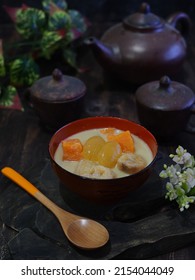 Kolak Or Indonesian Dessert For Breaking The Fast When Ramadan Month. Made From Pumpkin, Purple Sweet Potato, And Banana Cooked With Coconut Milk, Palm Sugar And Pandanus Leaves.