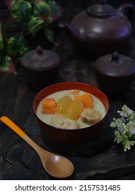 Kolak Or Indonesian Dessert For Breaking The Fast When Ramadan Month. Made From Pumpkin, Purple Sweet Potato, Sugar Palm Fruit, And Banana Cooked With Coconut Milk, Palm Sugar And Pandanus Leaves.