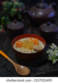 Kolak Or Indonesian Dessert For Breaking The Fast When Ramadan Month. Made From Pumpkin, Purple Sweet Potato, Sugar Palm Fruit, And Banana Cooked With Coconut Milk, Palm Sugar And Pandanus Leaves.