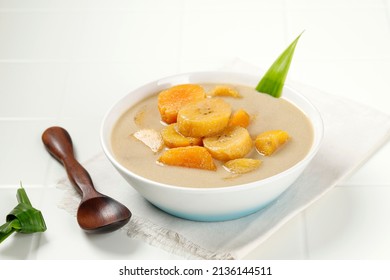 Kolak Pisang Ubi is Banana Sweet Potato Compote. Popular Indonesian Dessert Made from Coconut milk, Palm Sugar and Pandanus Leaves. Very popular during Ramadhan - Shutterstock ID 2136144511