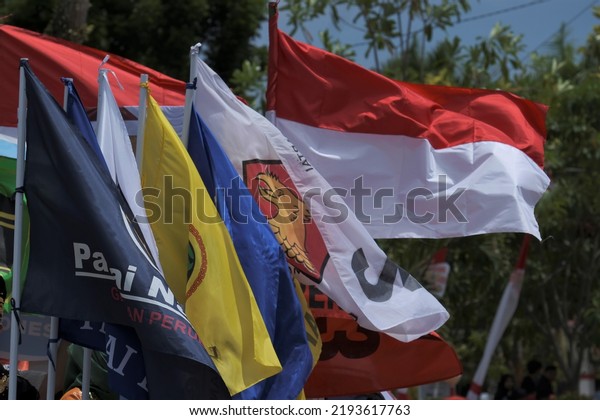 Kolaka, Indonesia - August 13, 2022 : Photos of\
the flags of political parties participating in the general\
election in Indonesia