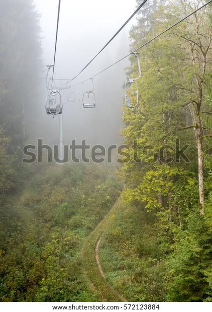 Kolben chair lift with cable\
structures in Kolbensattel mountain in Oberammergau,\
Germany