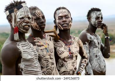 Kolcho, Ethiopia - August, 12: Unidentified Karo boys near the village of Kolcho, Ethiopia on August 12,2014. Karo tribe people are famous for their body painting