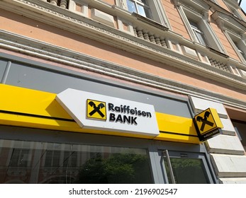 Kolin, Czech Republic - August 13, 2022: Raiffeisen Bank Name And Logo, Emblem Above Front Entrance To The Local Branch. International Financial And Retail Banking Institution. 