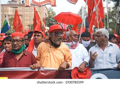 Kolkata, 02-28-2021: Communist Party Of India Marxist (CPIM) Party Leaders And Supporters Walking In A Political Rally On Their Way To Attend Brigade Parade Ground Meeting.