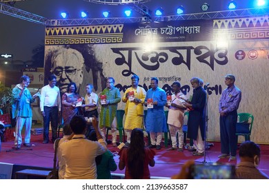 Kolkata, 03-03-2022: Distinguished guests holding just published books during a literary event organised on an open-air stage (known as Mukta Mancha) at 45th International Kolkata Book Fair. 