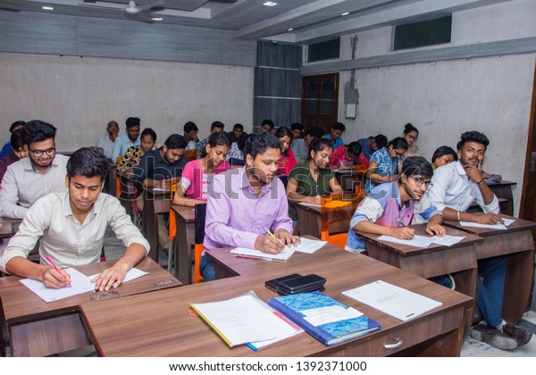 Kolkata; 8 May 2019, India: Students writing on
answer script in the final semester examination in a technical
college or high school. Examination process of Engineering college
in India.