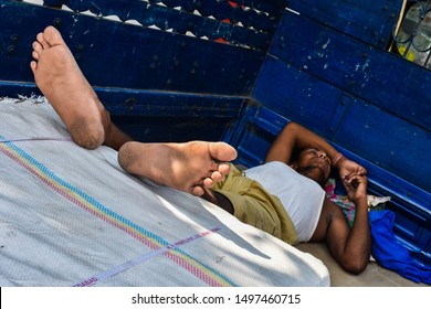 Kolkata, India - 3rd June, 2019 : A Daily Laborer Takes Rest In Between His Shifts.