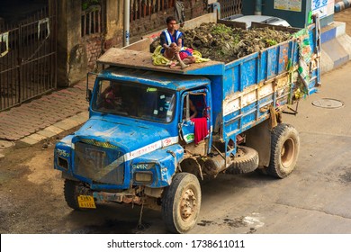 Kolkata, India - April 2020: Lockdown For COVID-19 - Man Sitting On Top Of A Truck