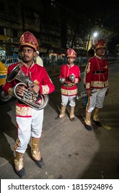 Kolkata, India, August 2020: Three Indian Wedding Band Musicians Practicing Their Daily Music Routine  In Evening On Road In Kolkata, India.