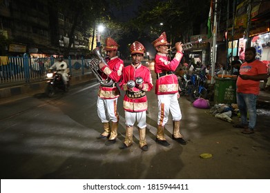 Kolkata, India, August 2020: Three Indian Wedding Band Musicians Practicing Their Daily Music Routine  In Evening On Road In Kolkata, India.