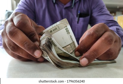 Kolkata, India Dated 15/08/2020. Man Counting Indian Currency With Hands.