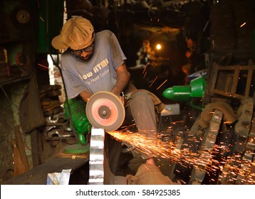 Kolkata, India - February 19, 2017: A Worker Welding Metal In An Unsafe Working Environment.