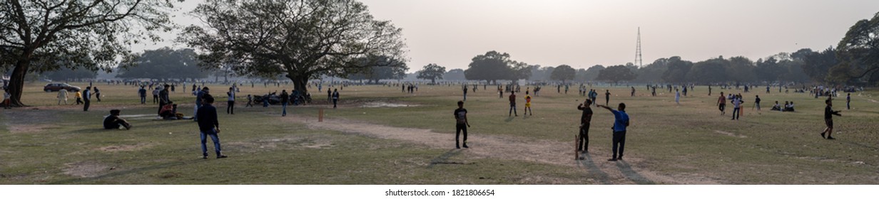 Kolkata, India - February 2, 2020: Panoramic View Of Unidentified People Plays Cricket In Maidan Park On February 2, 2020 In Kolkata, India