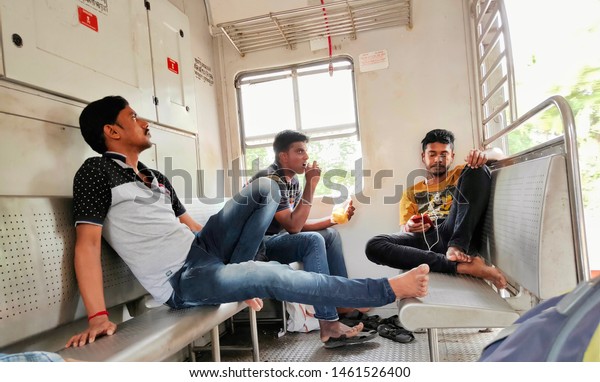 KOLKATA, INDIA\
- JULY 24, 2019: Passengers inside Indian Railway local train.\
Railway transport of Indian\
Railway