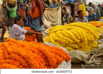 Kolkata, India - March 11, 2019: Indian Traders On Flower Market At Mallick Ghat In Kolkata. India