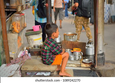 Kolkata, India - October 01, 2016: A Child Selling Tea In A Local Roadside Stall.