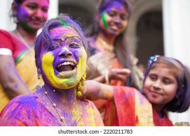 Kolkata, Kolkata India-March 12 2014: Students Of Rabindra Bharati University Celebrating, Playing And Enjoying Holi, The Festival Of Colors, With Colored Powder (abir).