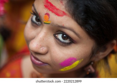 Kolkata, Kolkata India-March 12 2014: Students Of Rabindra Bharati University Celebrating, Playing And Enjoying Holi, The Festival Of Colors, With Colored Powder (abir).