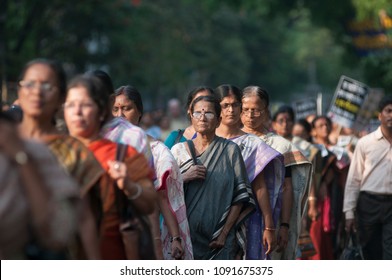 KOLKATA - MARCH 18: Women Marching In A Rally  To Protest Gang Rape Of A 70 Year Old Nun In Kolkata, India On March 18, 2015