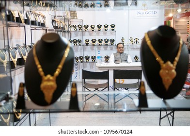 KOLKATA- NOVEMBER 9: A Shop Owner Sitting In His Shop Waiting During A Jewellery Trade Show In India -India Is One Of The Largest Markets For Gold On 9th November, 2014 In Kolkata, India.