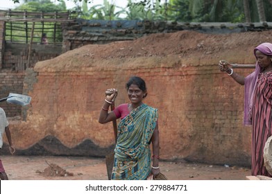 KOLKATA - OCTOBER 26 : Women Workers Working In Brick Manufacturing Industry Where They Live And Work Under Unhealthy And Unsafe Conditions On October 26, 2014 In Kolkata , India.