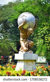 Kolkata, West Bengal / India - 03-03-2019 : Statue of Atlas at Alupur Zoo at Kolkata which was built around  200 years ago.Atlas was the Titan god who bore the sky aloft. 
