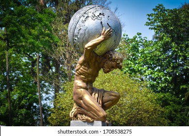 Kolkata, West Bengal / India - 03-03-2019 : Statue of Atlas at Alupur Zoo at Kolkata which was built around  200 years ago.Atlas was the Titan god who bore the sky aloft. 