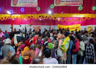 Kolkata, West Bengal, India - 12th January 2020 : Hindu devotees with families queing up for roti, Indian food, at Gangasagar transit camp, Outtram ghat, Kolkata.