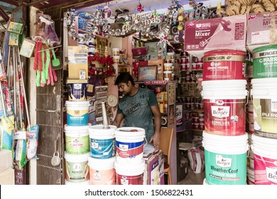 Kolkata, West Bengal, India 1st January, 2019 - A Paint Seller Shop Owner Working Inside His Hardware Store.